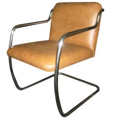 4 Stainless Steel framed armchairs by Brueton. 2