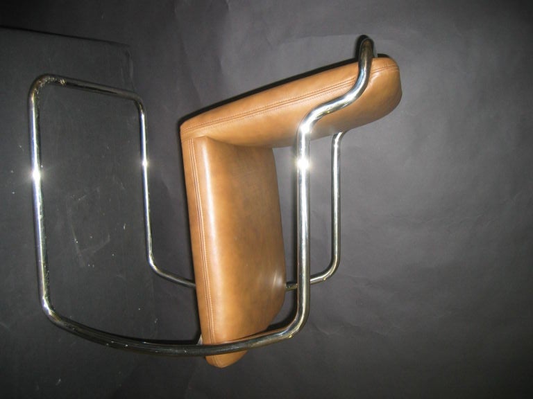 American 4 Stainless Steel framed armchairs by Brueton.