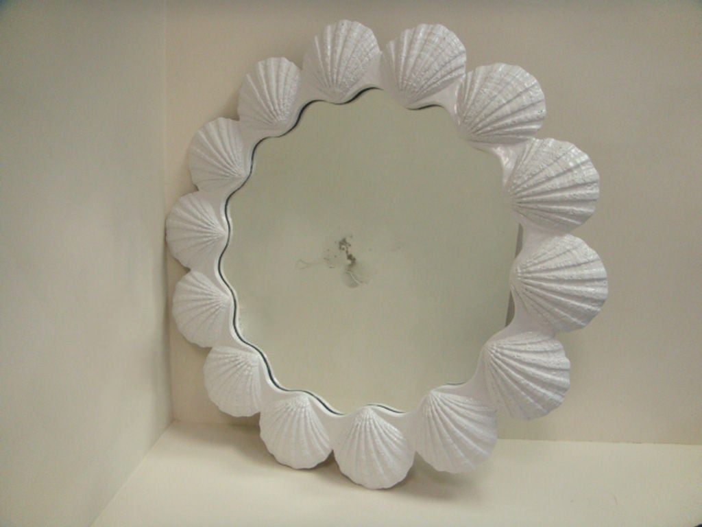 Vintage Round Resin Clam Shell Mirror with White Lacquered Finish<br />
Mirror Has Some Antiquing Towards the Center<br />
Sold As Is