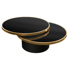 Coffee Table with 360 Degree Swiveling Black Glass Top