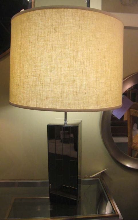 Large mirrored table lamp by Carl, located in NY.