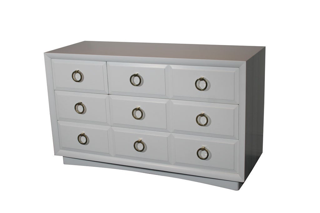 Elegant 9-drawer Gibbings dresser in beautiful white lacquer finish &<br />
distinctive brass pulls. Scaled beautifully to suit a variety of spaces.