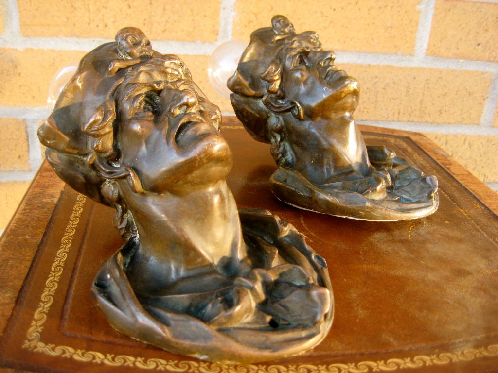 20th Century Exceptional Pair of E.F. Caldwell Bronze Pirate Sconces