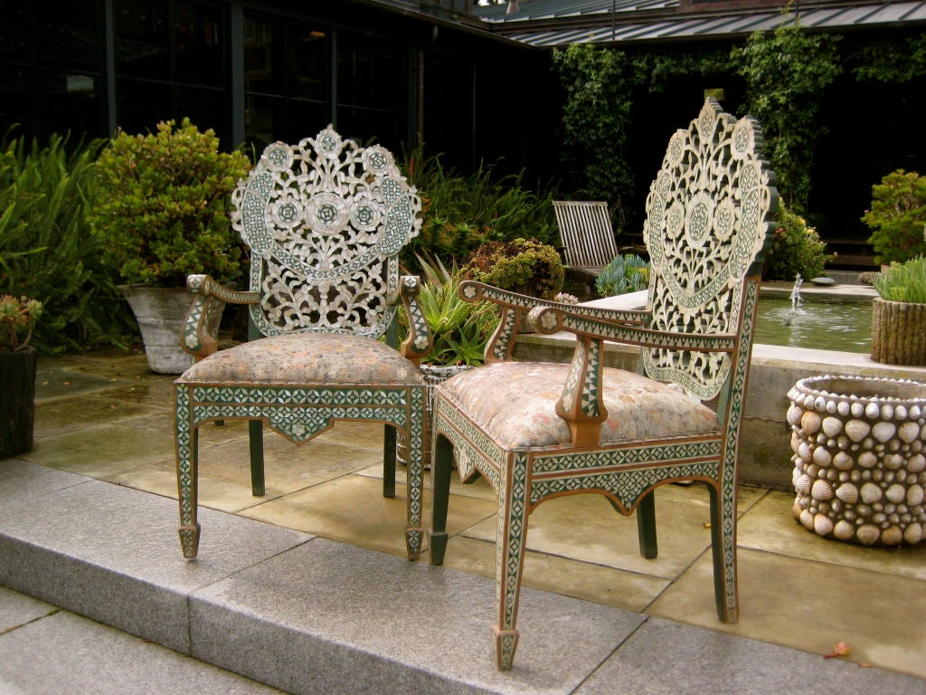 Exceptional pair of inlaid shell armchairs with beautifully upholstered seats.<br />
<br />
Back height: 43