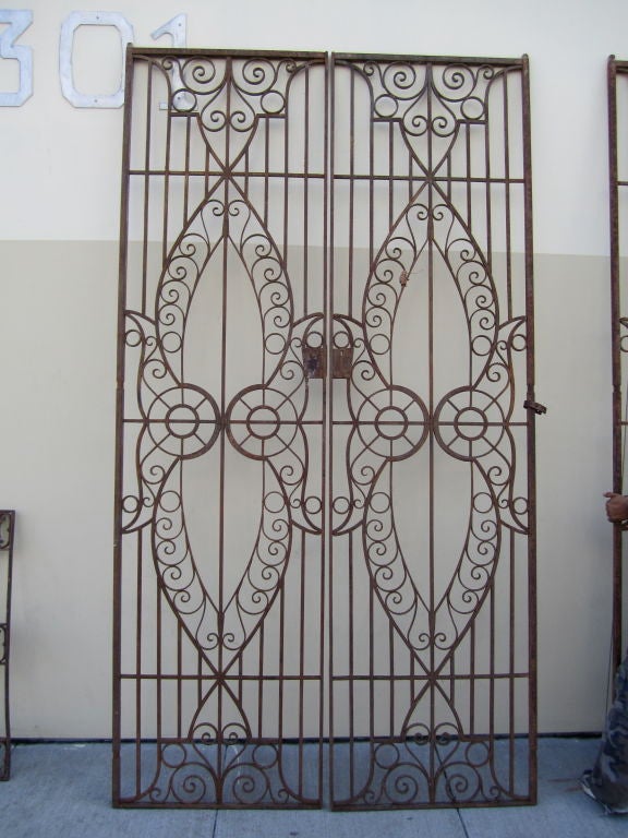 Extremely rare pair of colossal Egyptian iron gates. Another matching pair is available.

*We ship internationally*