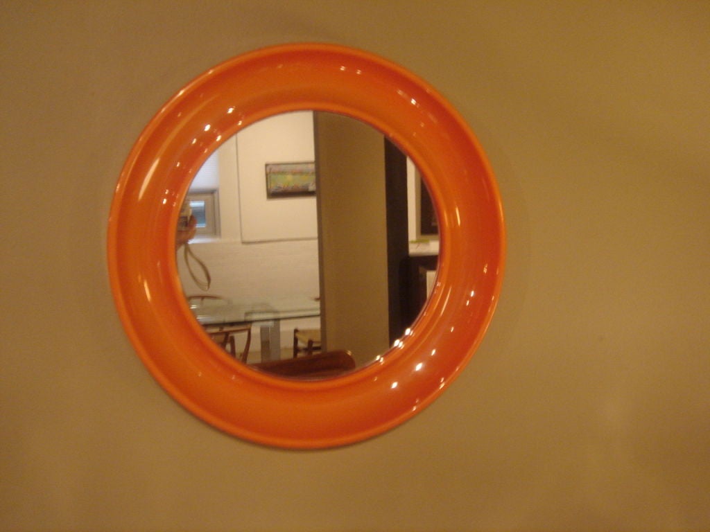 orange round mirror