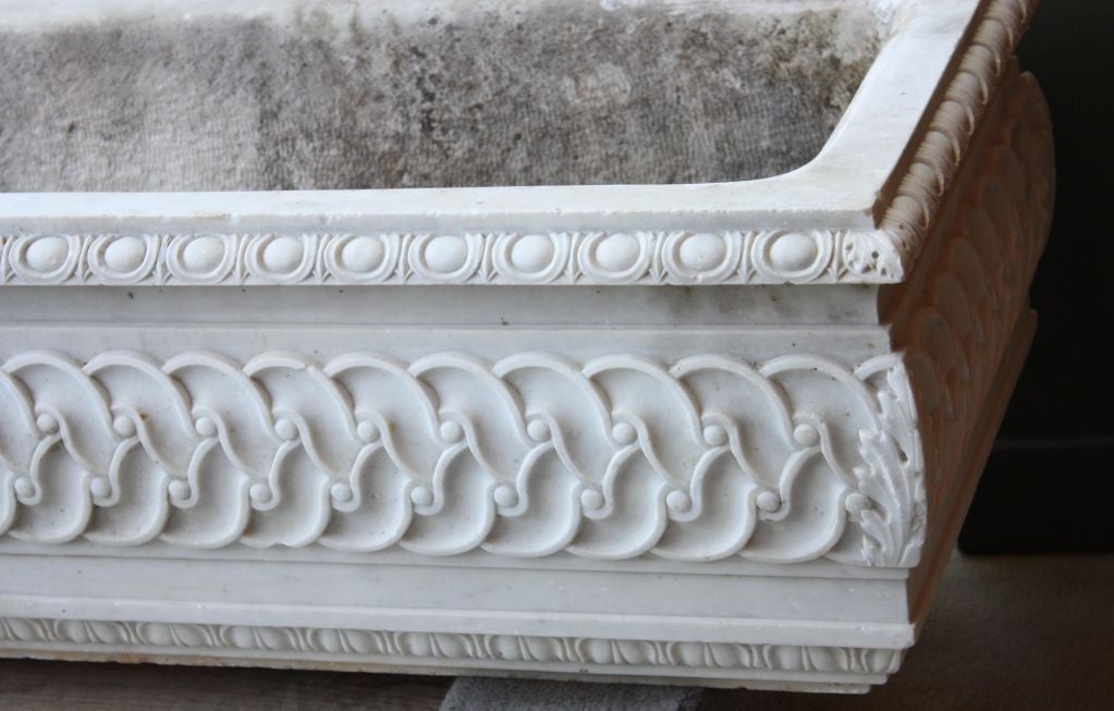 A beautifully carved white marble jardinaire / planter made during the 19th century in France or Italy. As there is no drain we think it might have been an elegant watering trough. This piece has been restored.