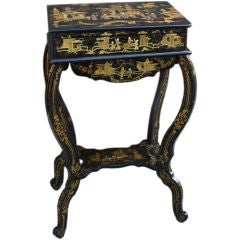 An Elegant French Lacquered Blsck and Gilt Chinoiserie Worktable