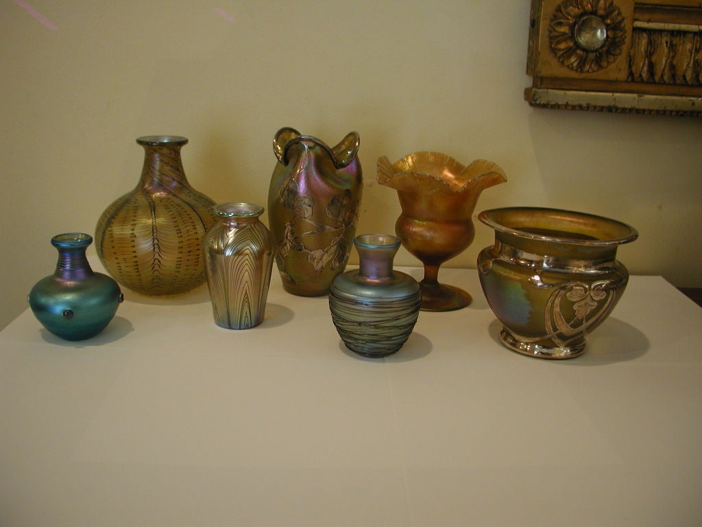 Priced Individually from $155-$775. - Left to Right.  1976 Lundberg Studios small blue vase with dots (2 3/4