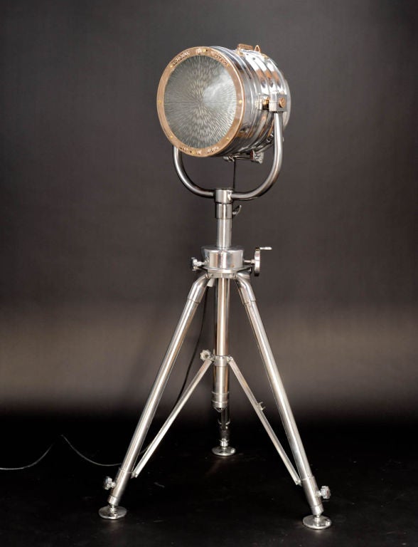 An incredible searchlight with a cross etched lens.  We have had it mounted on a polished Hercules tripod with wonderful moon landing feet.  It has a special detail in that it says MAD in the USA instead of made.  Very fun.