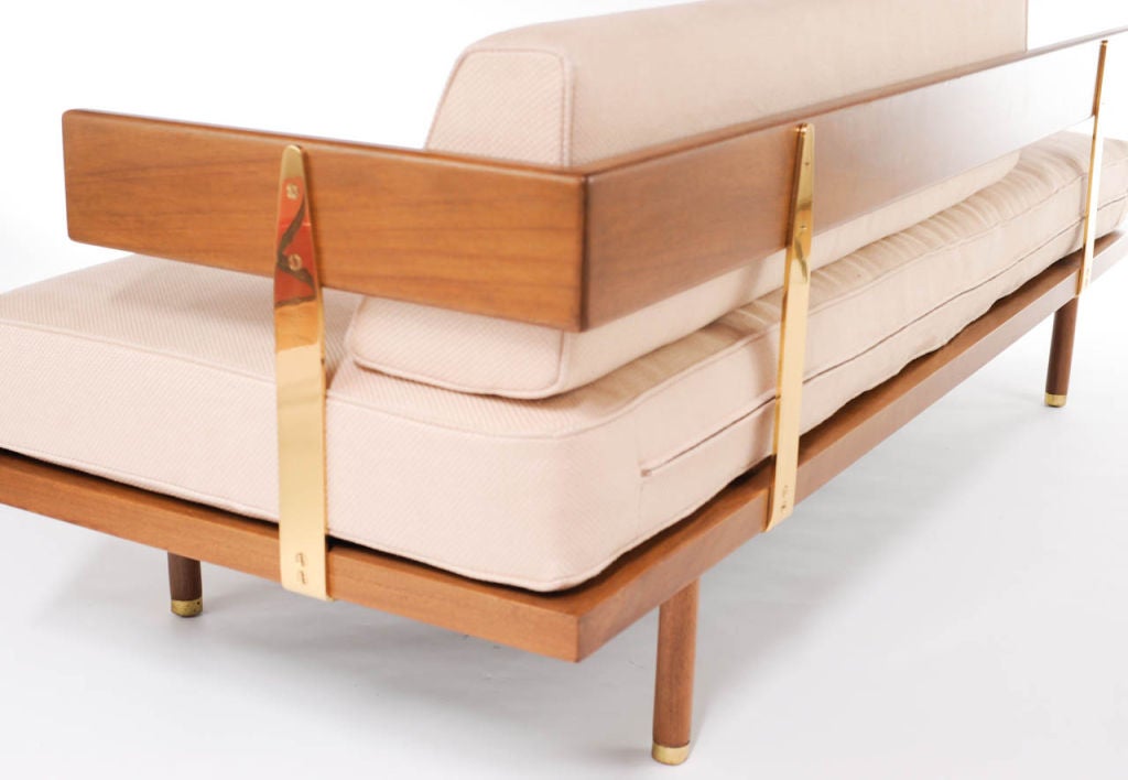 Harvey Probber's sculptural and elegant Brass and Walnut Daybed. All Original wood with large brass supports and feet. This daybed is meant to float in the middle of a tasteful living room. This was the showcase piece for Mr. Probber grand new