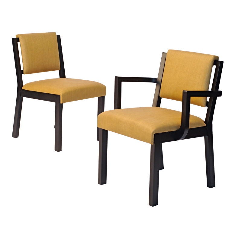 Beautifully refinished VKG dining chairs in a satin ebonized finish. The two floor models are reupholstered in a Calvin glazed linen. We have a large number of these chairs and we can build set to meet your needs. Side chairs measure: 29.75