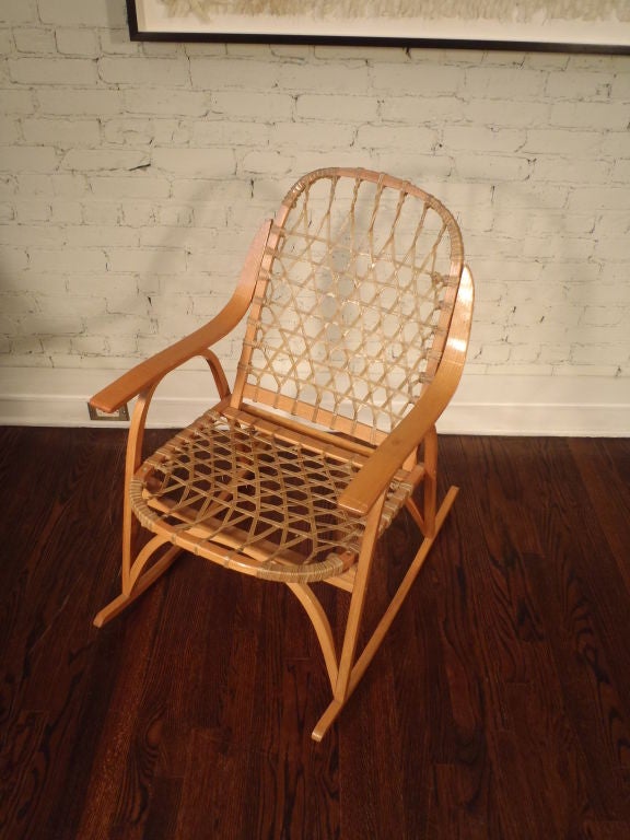 Bent/steamed oak rocker with snow shoe-inspired back and seat, made by snow shoe manufacturer Snocraft