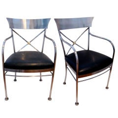 TWO PAIR OF STEEL ARMCHAIRS BY DESIGN INSTITUTE OF AMERICA