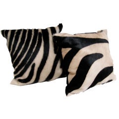 TWO FAUX ZEBRA PILLOWS