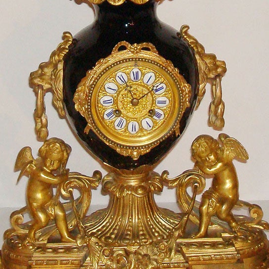 Exceptional French 19th century bronze dore garniture clock set