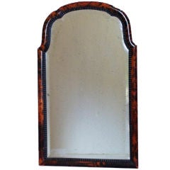 19th century red tortoise beveled mirror.