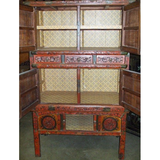 19th century carved and lacquered Oriental cupboard.