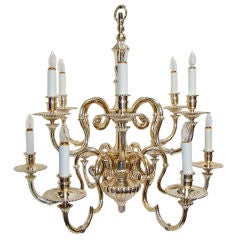 Silvered over bronze tiered chandelier with 12 lights.