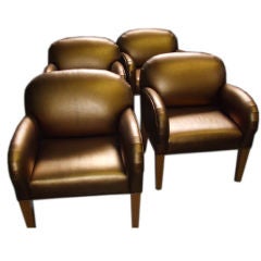 Set of 4 gold leather chairs