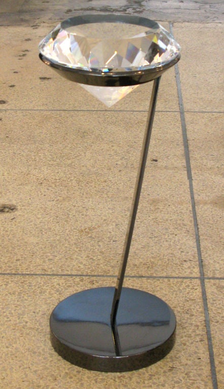 Polished black nickel frame holds a stunning, oversized diamond.  This unique accent table is the perfect size for a single cocktail.  Designed by William Emmerson.  Also available in polished nickel finish.  

* ON SALE.  Originally $2400.  No