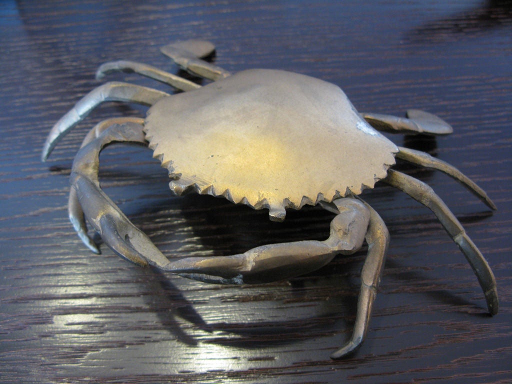Unique polished brass crab trinket box.  Top crab shell opens to an oval shaped box measuring  2