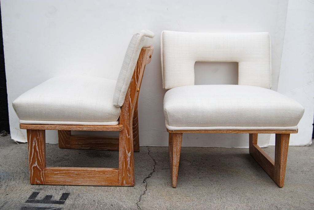A great pair of chairs by Laszlo for Brown Saltman.<br />
Restored in a ceruse finish with white tussah silk upholstery.