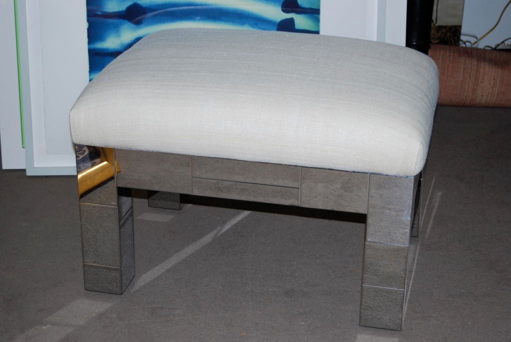 A really nice rectangular ottoman in all chrome with tussah silk upholstery.