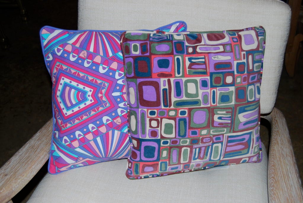 Signed.<br />
Priced individually.<br />
Smaller pillow: 14x14x4