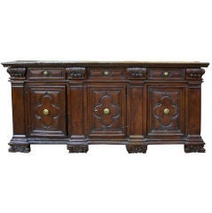 A Large-Scaled Italian Baroque Carved Walnut 3-Door Credenza