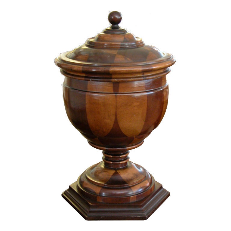 A Warmly-Patinated English Turned-Treenware Covered Urn