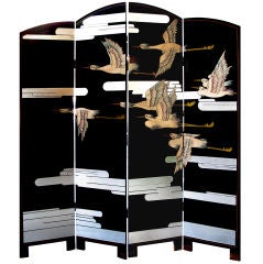 A Chic American Art Deco Lacquered Screen Depicting a Soaring Flock of Birds