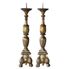 A Shapely Pair of Italian Baroque-Style Giltwood Pricket Sticks