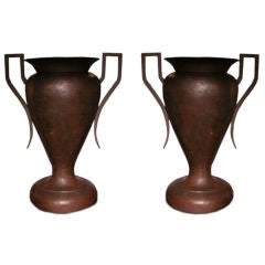 A Massive Pair of American Art Deco Iron Double-Handled Urns