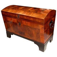 A Boldly-Scaled German Biedermeier Walnut Domed Trunk with Parquetry Reserves