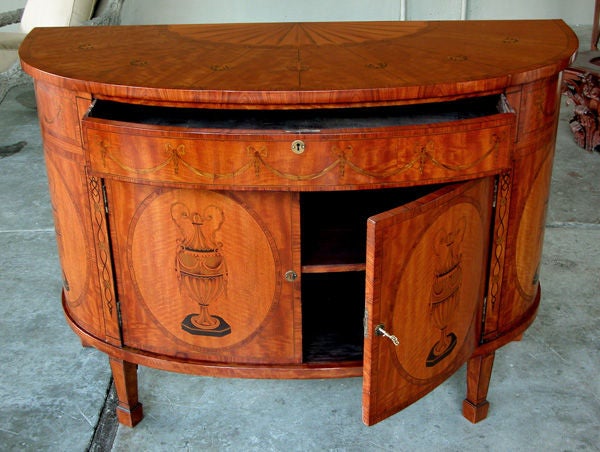 An Elegant and Finely  Inlaid English Edwardian Satinwood Bow Front Cabinet