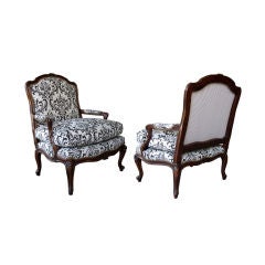 An Over-Scaled Pair of French Louis XV Style Beechwood Open Arm Chairs