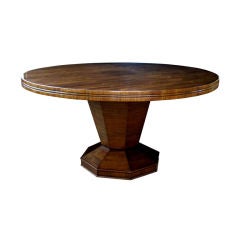 A Boldly-Scaled American Walnut Circular Center/Dining Table