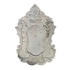 A Boldly-Scaled Venetian Cut Glass Cartouche-Shaped Mirror