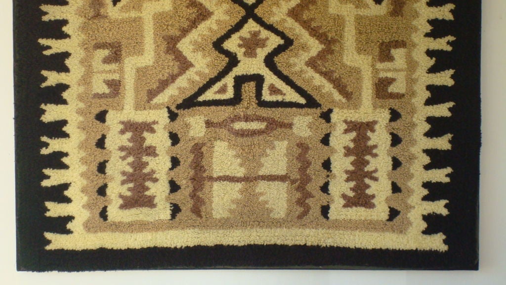 American hand-hooked rug with Indian design pattern on a stretch frame sewn on black linen. Wonderful geometric pattern, great condition. Found in the mid-west.