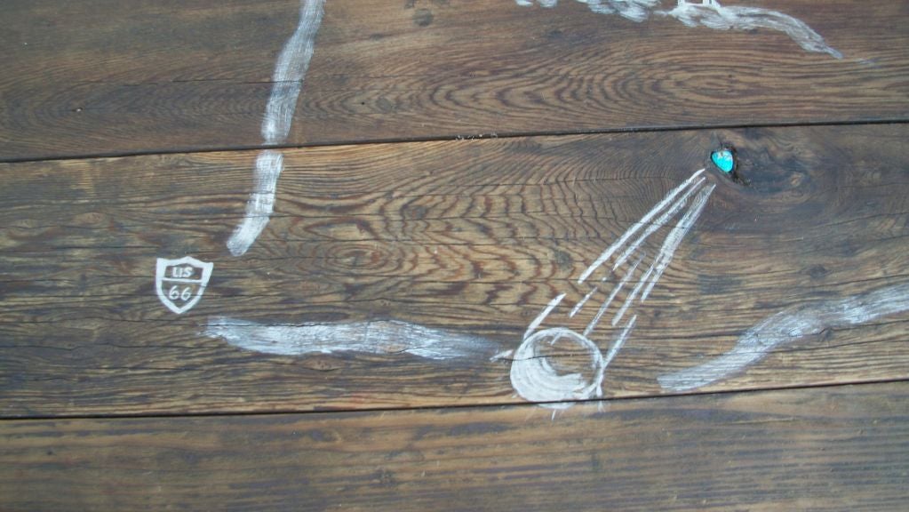 THIS ORIGINAL PAINTED DECORATED TABLE TOP IS IN WHITE DETAIL. A NATURAL WOOD GROUND. IT HAS THREE TURQUOISE NUGGETS EMBEDDED IN THE TABLE AND A PAINTED DECORATED MAP OF THE SANTA FE, NEW MEXICO MISSION AREA. INCLUDED IN THIS DECORATIONS ARE FIGURES