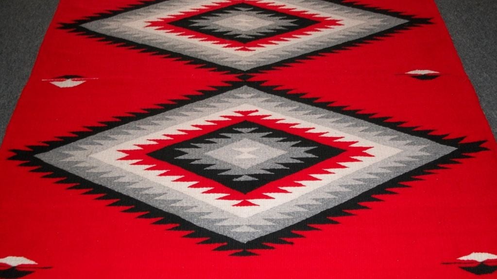 THIS FANTASTIC WEAVING WORKS AS A RUG OR A WALL HANGING. THE CONDITION IS GOOD AND GRAPHICS ARE GREAT. IT IS WOOL AND HAS THE ORIGINAL CORNER TIES. THIS EYE DAZZLER IS FANTASTIC.IT IS A TRUE RED BACK ROUND.