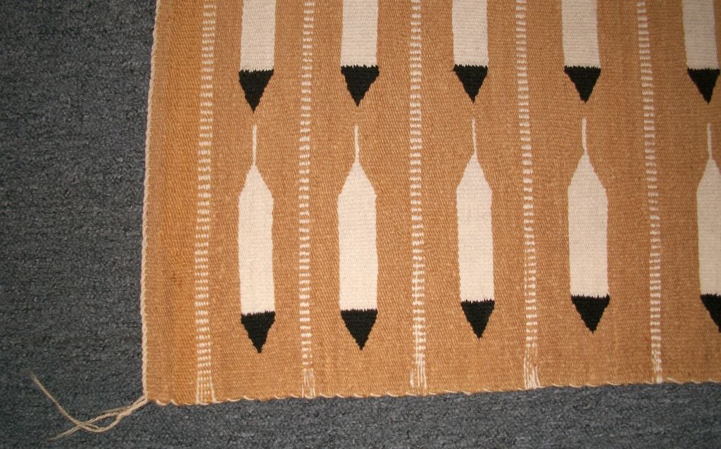 THIS FANTASTIC WEAVING/FEATHER PATTERN RUG IS IN PRISTINE CONDITION AND HAS ALL THE ORIGINAL CORNER TIES. THE COLORS ARE GREAT AND UNUSUAL.