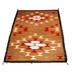 1940
S NAVJO WEAVING W/CAMEL GROUND