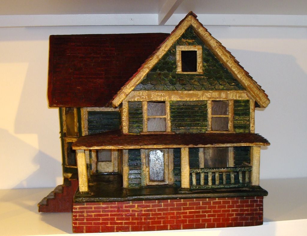 19THC FOLKY ORIGINAL PAINTED VICTORIAN DOLL HOUSE W/TIN SHINGLED ROOF AND WOOD SHINGLED TOP ROOF. WONDERFUL PAINTED FO-BRICK BASE W/STAIRS. ORIGINAL GLASS IN WINDOW FRAMES. SOME HAVE VICTORIAN CURTAINS IN WINDOWS. WONDERFUL ORIGINAL SURFACE. THE
