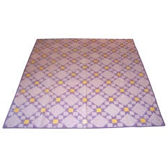 20TH C. LAVENDER AND YELLOW STARS QUILT