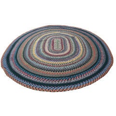 20TH C. LARGE OVAL BRAIDED RUG/WOOL AND MULTI COLORED
