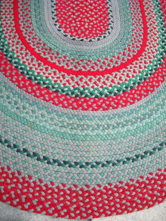 1940'S OVAL BRAIDED WOOL RUG /RED, GREENS, GREY