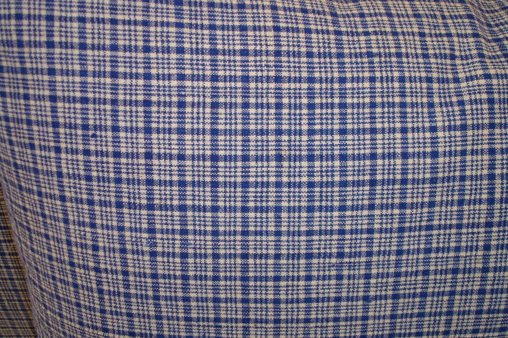 LINEN PLAID PILLOWS IN BLUE AND WHITE. BACKING HOMESPUN. ZIPPERED W/ FEATHER AND DOWN INSERT. 295 EACH