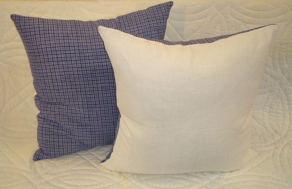 American 19TH C. LINEN PLAID PILLOWS IN BLUE AND WHITE.